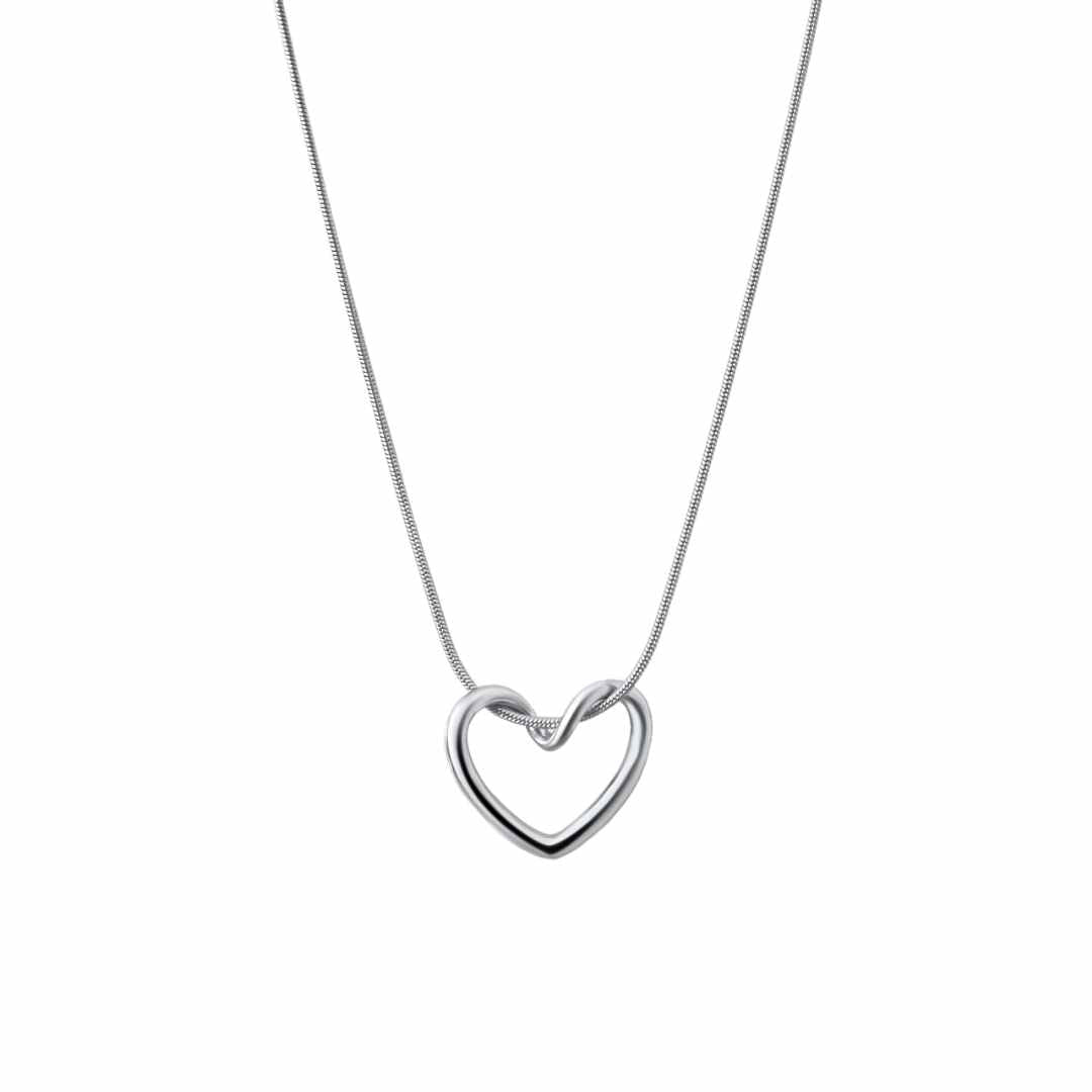 A silver pendant necklace featuring a twisted heart charm on a dainty snake chain.