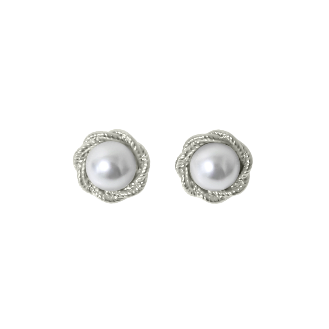 Pair of pearl earrings with silver wire-like designs on a white background