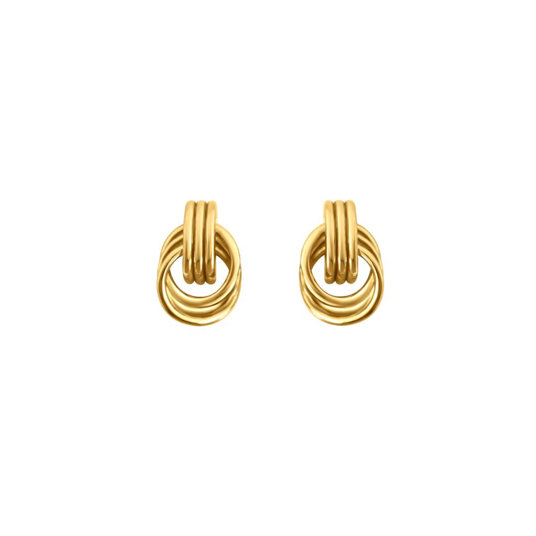 A pair of vintage-inspired gold-colored stud earrings with a knot detail.