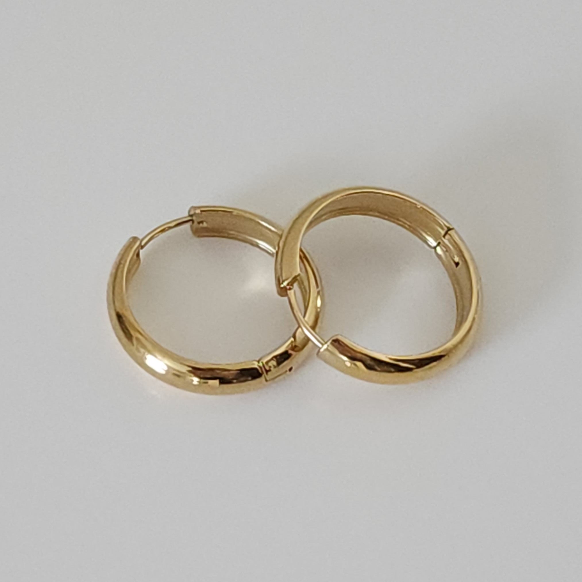 Sylvie Classic Hoop Earrings on a light gray background