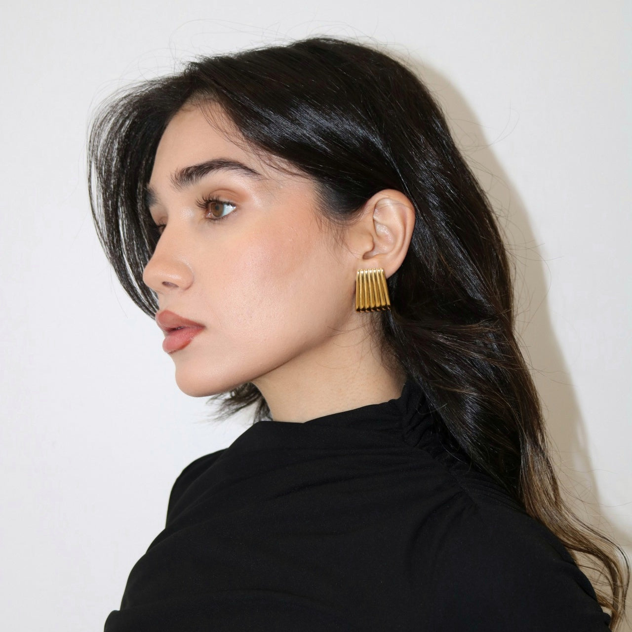 Cerise Jewelry Charlotte Ribbed Stud Earrings on Model on Model